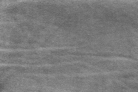 old gray denim close-up for background or wallpaperの写真素材