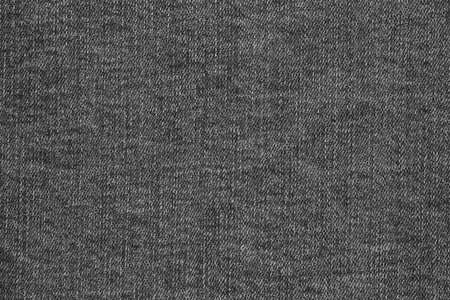 old black denim fabric texture for background or desktop wallpaperの写真素材