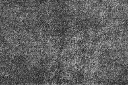 fluffy texture of terry fabric close-up for abstract monochrome spotted tones of black and grayの写真素材