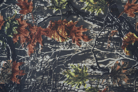 abstract forest floral camouflage pattern on fabric for background and wallpaperの写真素材