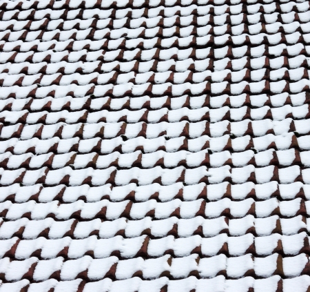 Tiles of roof in winterの写真素材