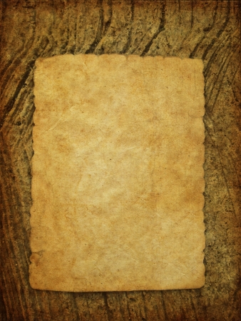 Old paper on wallの写真素材