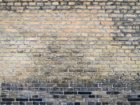 Background of dark retro brickwall textureの写真素材