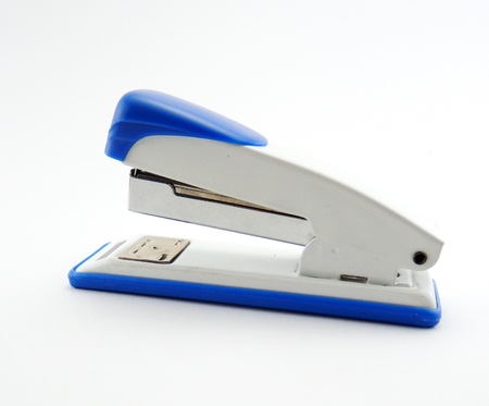 Blue stapler on white backgroundの写真素材