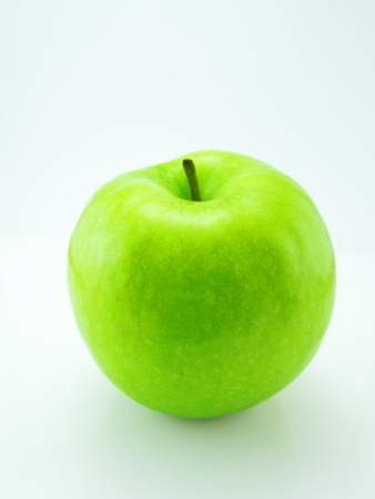 Green apple Isolated on a white backgroundの写真素材