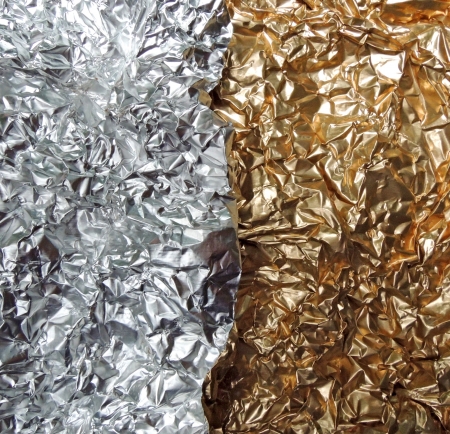 Collage of silver and gold aluminium foilの写真素材