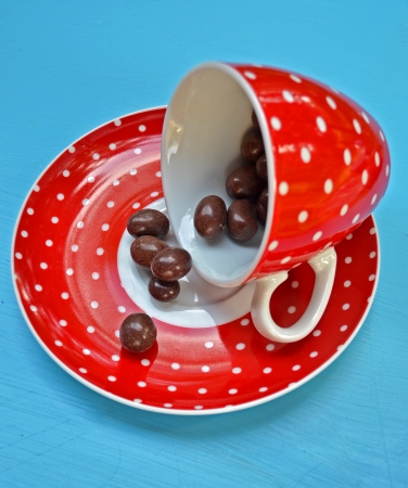 Cup off coffee with chocolate candyの写真素材