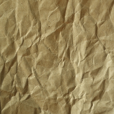 Old vintage crumpled paper backgroundの写真素材