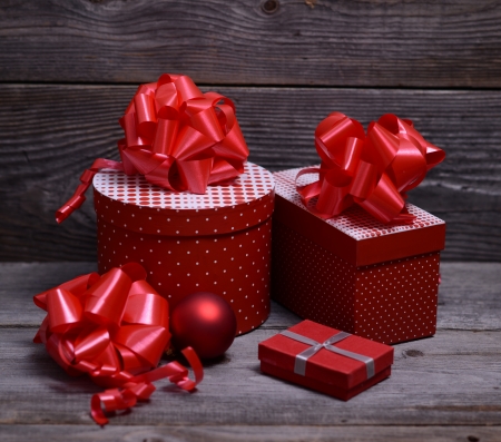 Christmas Presents and Ornaments on Wooden Background の写真素材