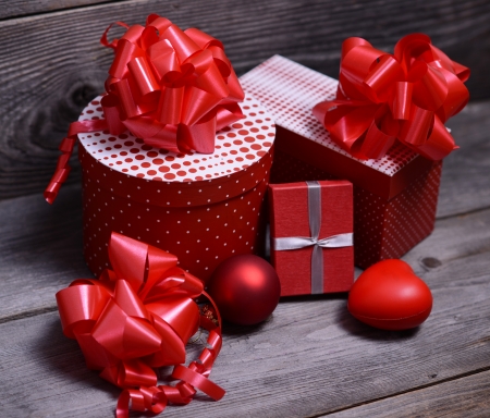 Christmas Presents and Ornaments on Wooden Background の写真素材