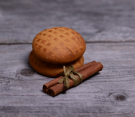 Cinnamon and gingerbread on woodenの写真素材