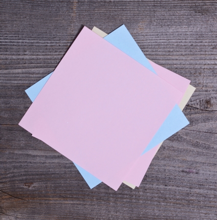 Colorful stickers on wooden backgroundの写真素材
