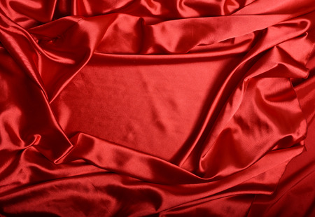 background of red silk with a place for textの写真素材