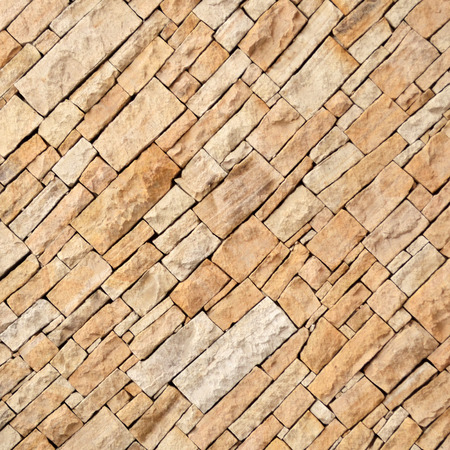 Beautiful diagonal stone wall backgroundの写真素材
