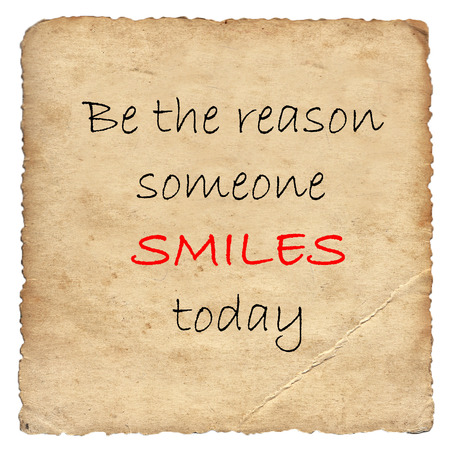 Inspirational motivating quote on old paper backgroundの写真素材