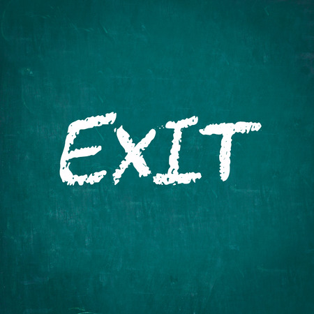EXIT written on chalkboardの写真素材