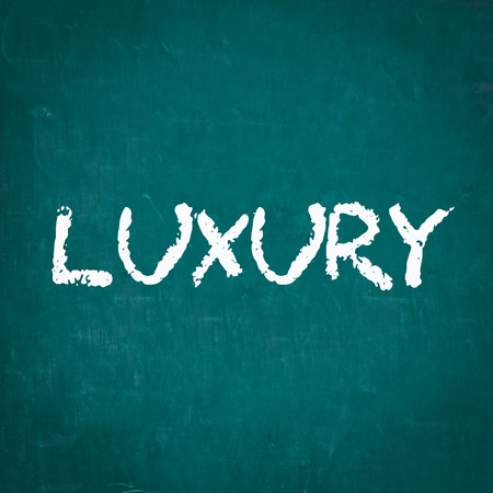 LUXURY written on chalkboardの写真素材