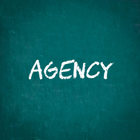 AGENCY written on chalkboardの写真素材