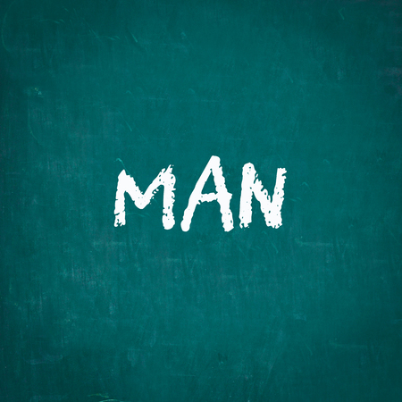 MAN written on chalkboardの写真素材
