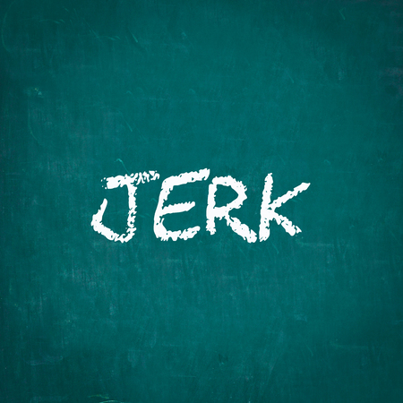 JERK written on chalkboardの写真素材