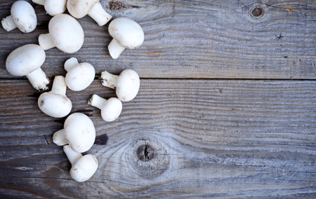 Champignon on vintage wood table backgroundの写真素材