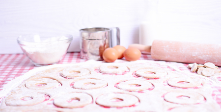 Baking donuts in kichenの写真素材