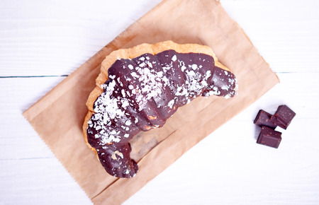 Chocolate croissant on white backgroundの写真素材