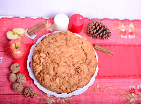 Christmas cake with apples and walnutsの写真素材