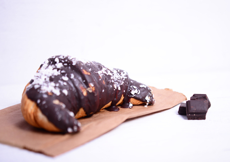 Chocolate croissant on white backgroundの写真素材
