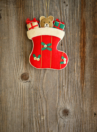 Christmas ornament on wood backgroundの写真素材