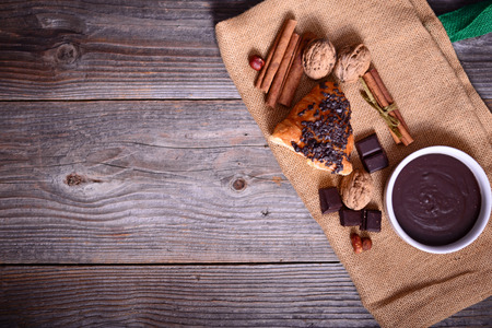 Chocolate croissant on wooden backgroundの写真素材