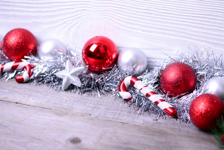 Christmas ornaments on wooden backgroundの写真素材