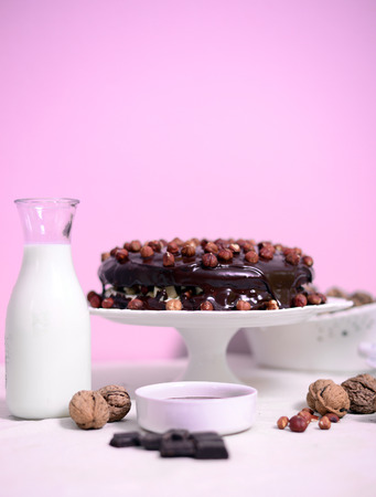 Delicious chocolate cakes with hazelnut on table close-upの写真素材
