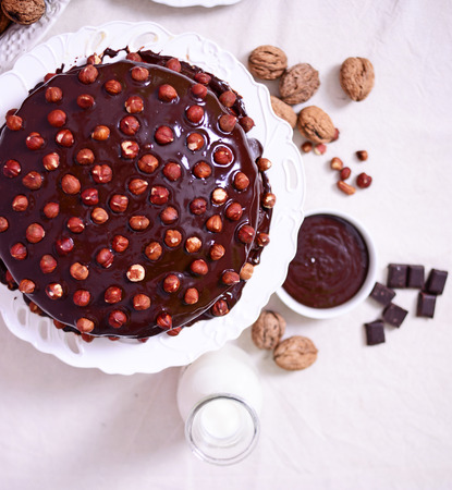 Delicious chocolate cakes with hazelnut on table close-upの写真素材
