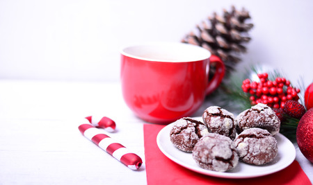 Christmas ornaments with cookies and hot chocolate on white backgroundの写真素材