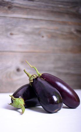 Eggplant on white wood backgroundの写真素材