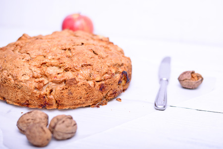Fresh Christmas cake on white wooden tableの写真素材