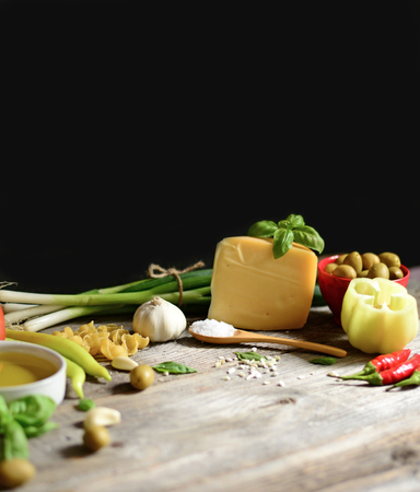 Italian and Mediterranean food ingredients on old wooden background.の写真素材