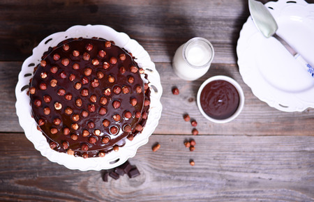 Hazelnut-chocolate cake on wooden backgroundの写真素材