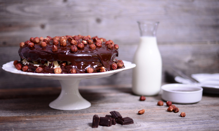 Hazelnut-chocolate cake on wooden backgroundの写真素材
