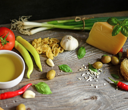 Italian and Mediterranean food ingredients on old wooden background closeupの写真素材