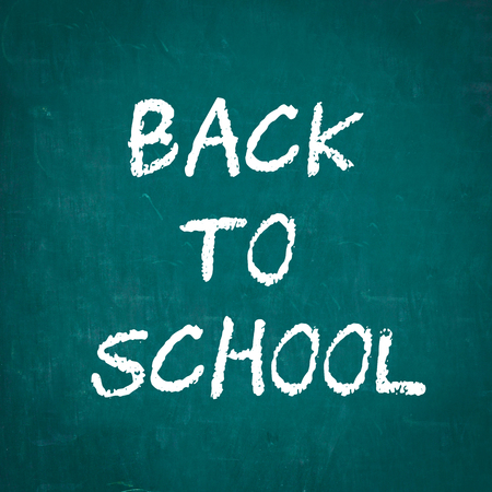 BACK TO SCHOOL written on chalkboardの写真素材