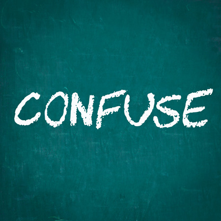 CONFUSE written on chalkboardの写真素材