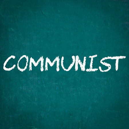 COMMUNIST written on chalkboardの写真素材