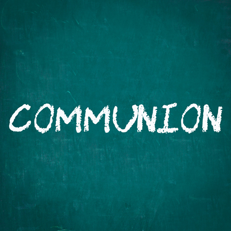 COMMUNION written on chalkboardの写真素材