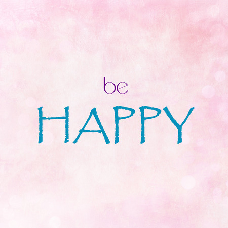 BE HAPPY on pink pastel backgroundの写真素材