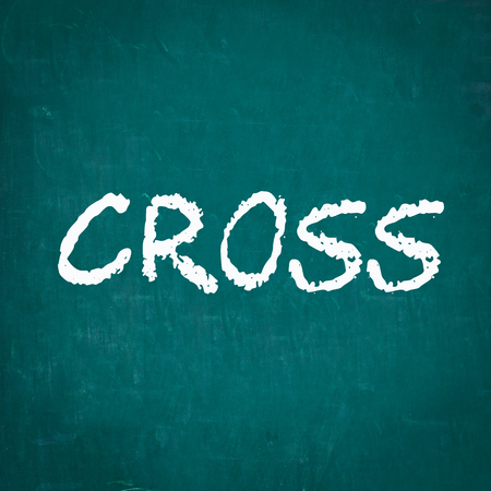 CROSS written on chalkboardの写真素材