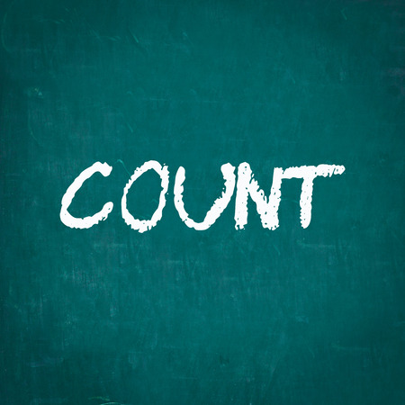COUNT written on chalkboardの写真素材