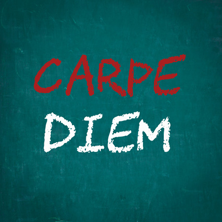 CARPE DIEM written on chalkboardの写真素材