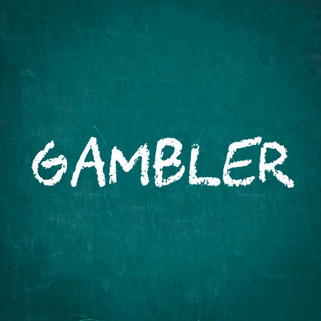 GAMBLER written on chalkboardの写真素材